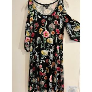 Karen Kane floral print dress. Cut out at shoulder. Sleeves 3/4 flared Size S